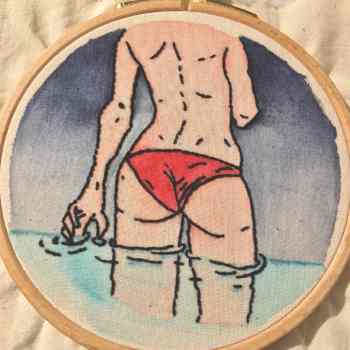 Embroidry of a women, standing in water up to her knees