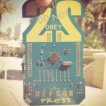 A DEFCON 22 press entry badge